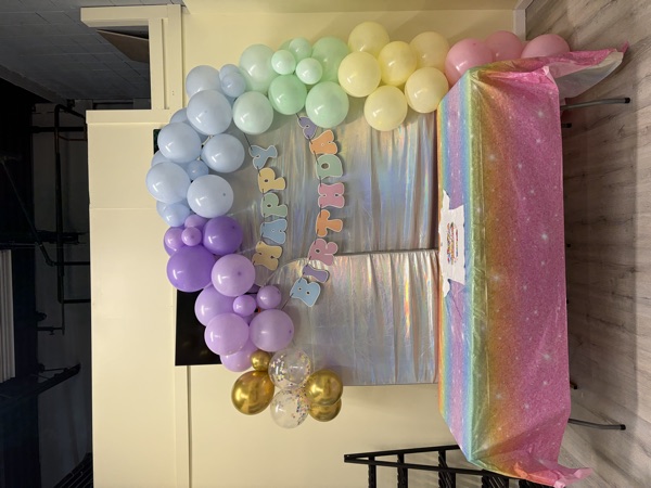 Pastel Rainbow Garland & Shimmering Backdrop
